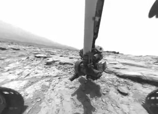 Jipe-sonda Curiosity trabalhando.