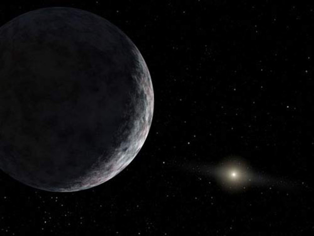 Concepção artística do planeta anão Eris. Astrônomos dizem que mundos maiores podem existir na beirada do sistema solar. Crédito: NASA / JPL / Caltech